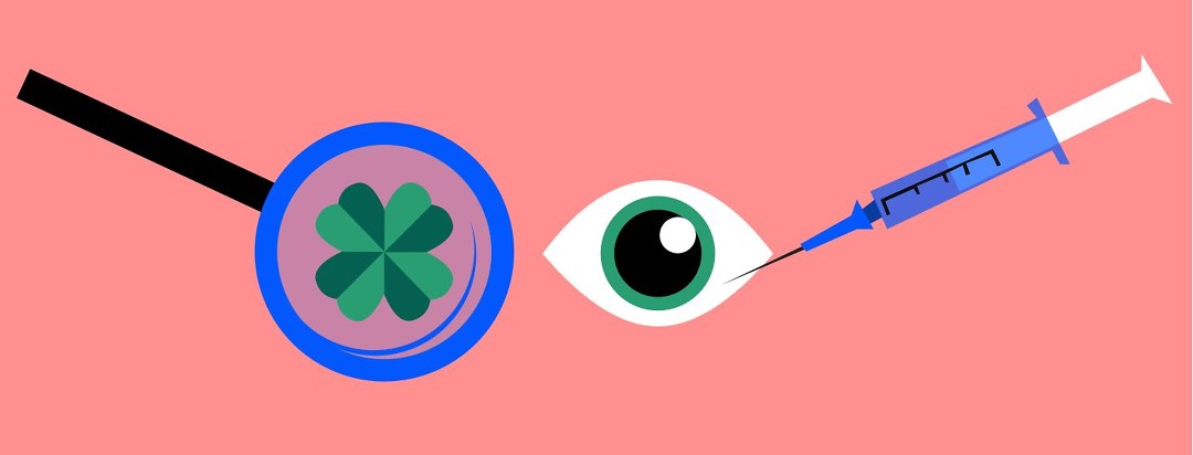 A magnifying glass looking at a four leaf clover and an eyeball looking at a needle.