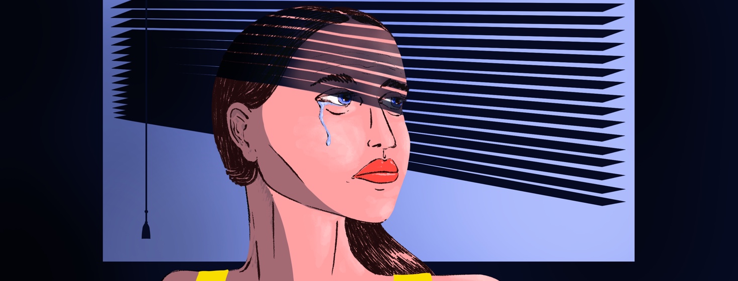 A woman faces toward an unseen window, the the blinds casting a shadow on her and the wall behind her, covering one eye and part of the other that is crying a single tear.