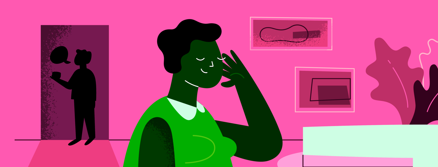 A woman with her back turned listening as another person calls out entering from a doorway.