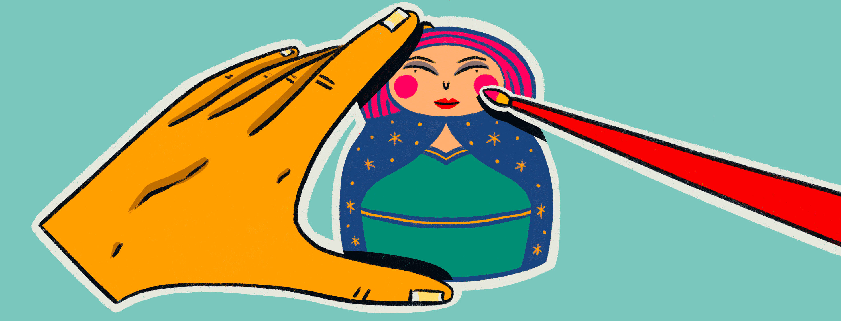 Hand holding a figurine as its being painted