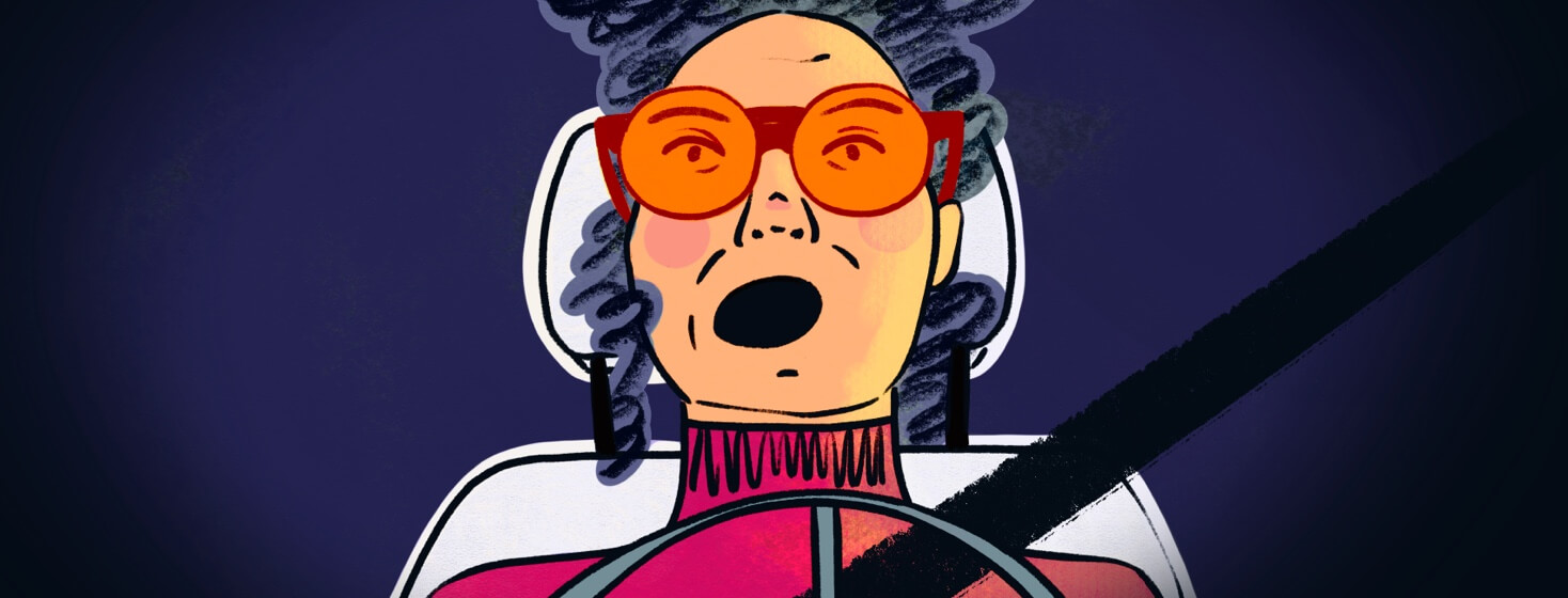 Adult woman looking shocked in a car