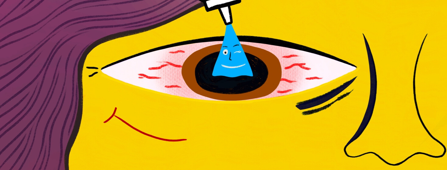 A person getting drops in their eye