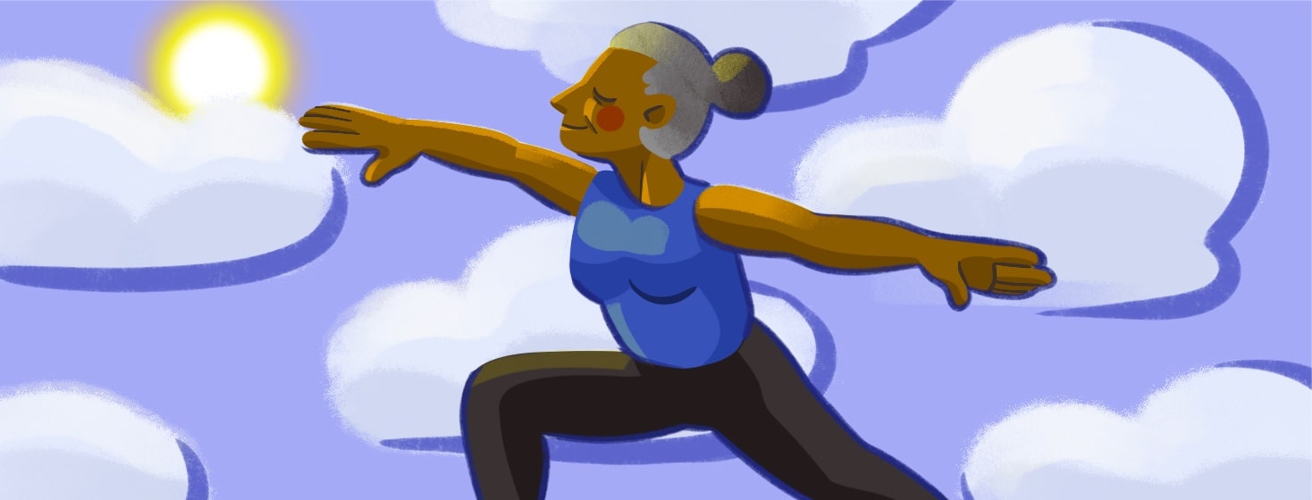 Senior black woman does yoga outside