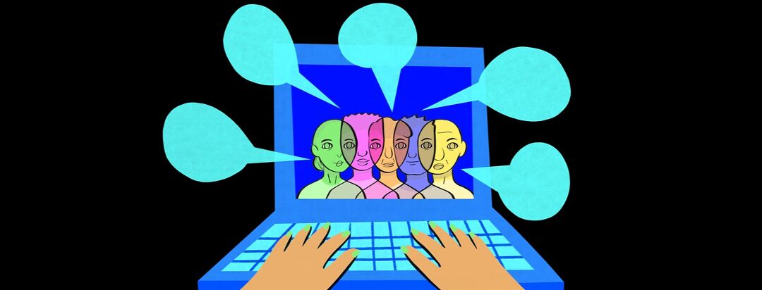 Hands typing on a computer, the screen has different people on it with speech bubbles popping off the screen